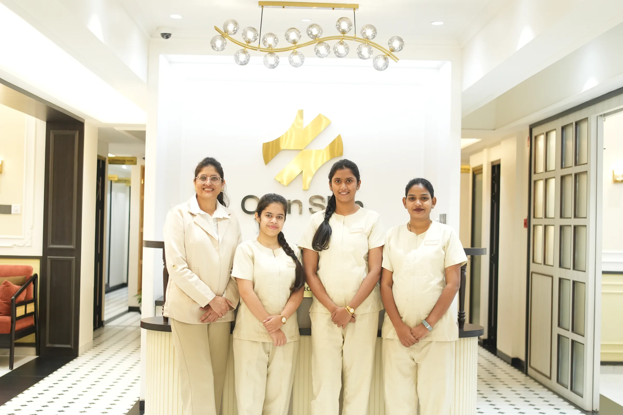 The Own Skin Dermatology & Advanced Aesthetics team at the clinic reception in Camp, Pune